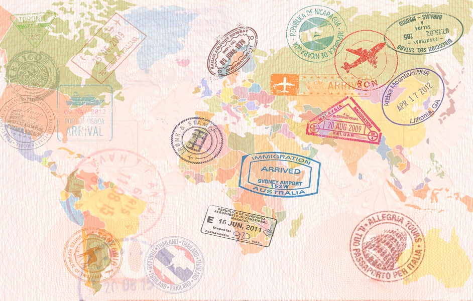 Colorful map of the world covered in passport stamps.