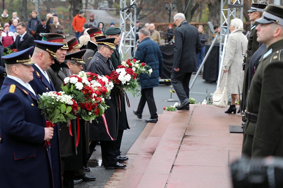  Military leaders of allied nations stand with flowers in hand, to take part in a Flower Laying ceremony at Riga's Freedom Monument