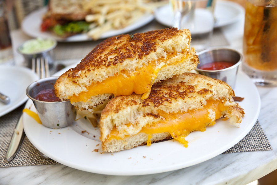 Photo of grilled cheese sandwich on a plate