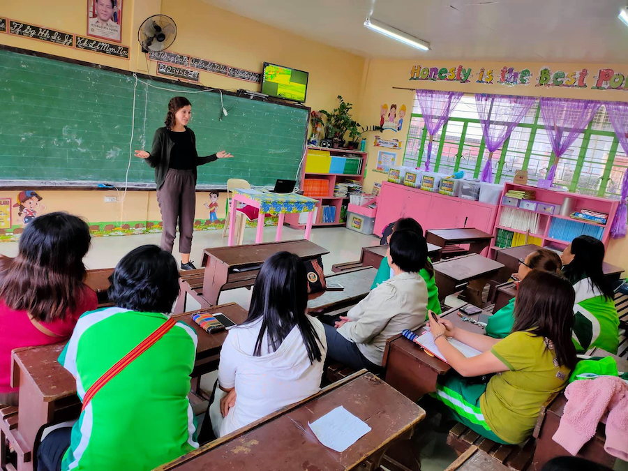 Patricia Fontanet speaks to a class about flood preparedness while working with the Peace Corps in La Trinidad, Philippines.
